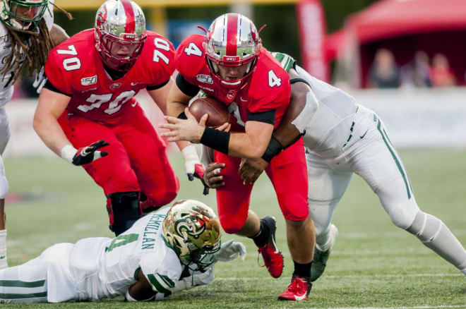Cole Spencer paving the way for WKU in a 2019 game versus Charlotte. (Photo: bgdailynews.com)