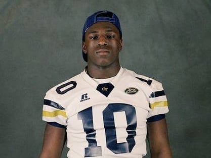 Gee poses in a GT uniform during an unofficial visit 