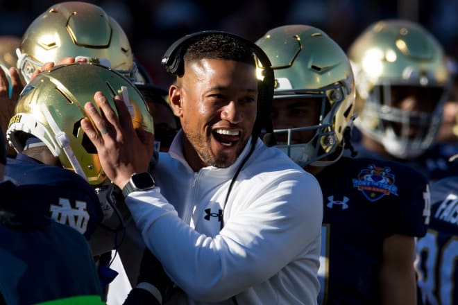 Notre Dame head football coach Marcus Freeman has plenty to smile about as the Irish head into winter workouts next week. 