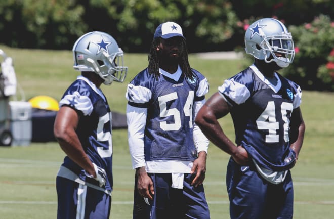 Jaylon Smith (center) said he could have played at an "elite level" in the playoffs.