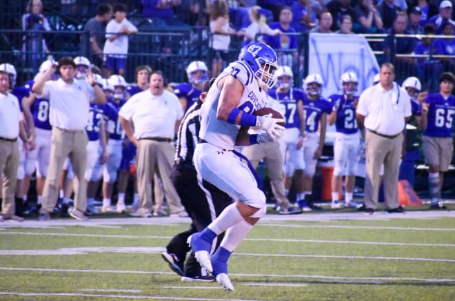 Alexandria (Ky.) Covington Catholic tight end Michael Mayer caught four passes for 129 yards and two touchdowns, and also returned an interception 60 yards for a score, in a 52-36 victory versus Indianapolis Bishop Chatard.