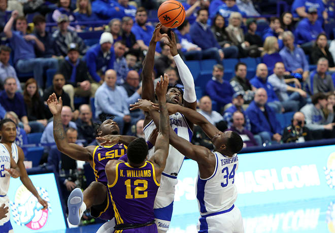 Kentucky's Chris Livingston soared above the crowd to pull down a rebound late in Tuesday's game against LSU at Rupp Arena.