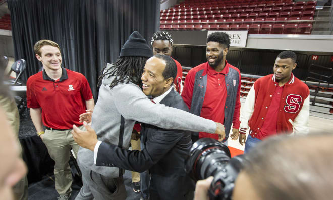Former Pack guard Cat Barber gives Keatts a hug after the press conference. 