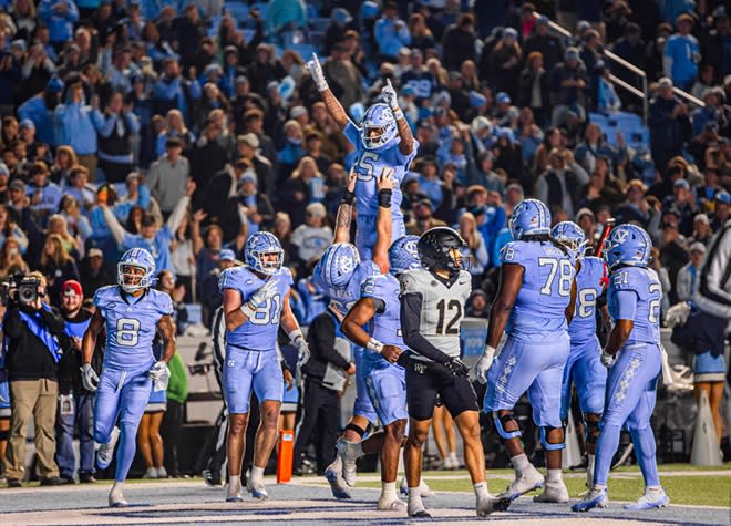 North Carolina UNC Tar Heels football 31 24 Wake Forest bowl eligible third straight win Mack Brown