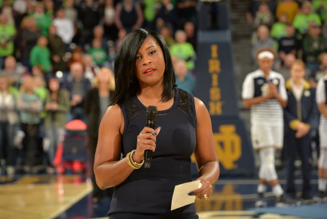 Associate head coach and former star guard Niele Ivey was inducted into Notre Dame's Ring of Honor before the game.