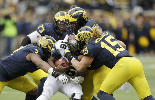 Michigan finished 8-5 and unranked for the first time under Jim Harbaugh.