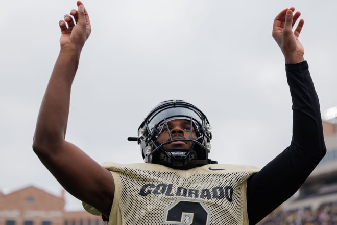 Shedeur Sanders conducting the band after his touchdown.