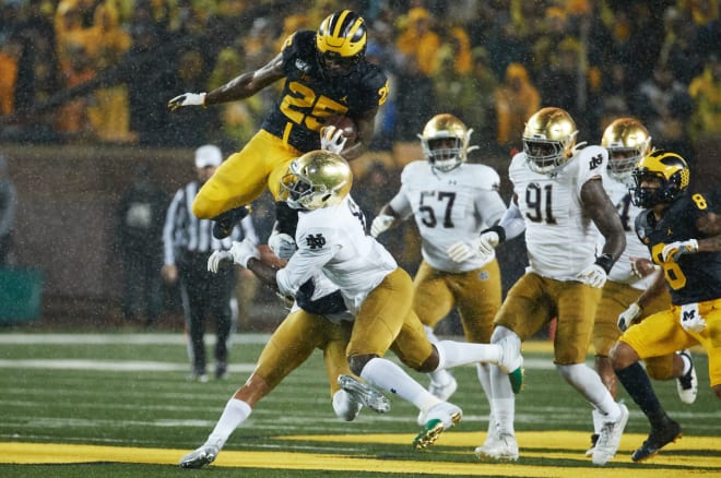 Michigan Wolverines football redshirt freshman running back Hassan Haskins has already racked up 73 yards in the first half.