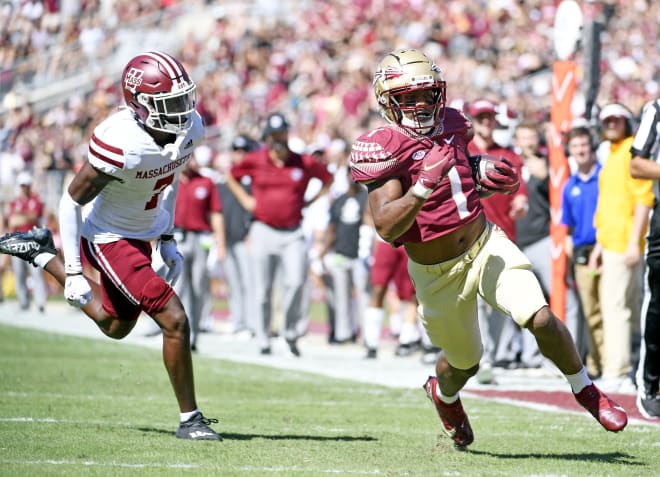 Oct 23, 2021; Tallahassee, Florida; Florida State Seminoles running back DJ Williams (1) scores a touchdown during the second half against the University of Massachusetts Minutemen at Doak S. Campbell Stadium. 