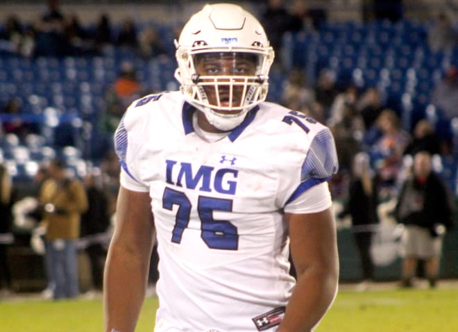 Rivals 100 offensive lineman JC Latham committed to the Alabama Crimson Tide on Friday.