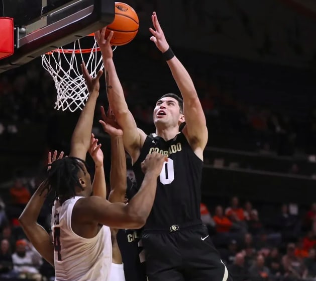 Colorado forward Luke O'Brien goes for a rebound against Oregon State