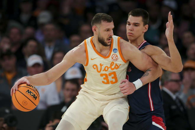 Tennessee forward Uros Plavsic tries to move the ball on Florida Atlantic center Vladislav Goldin the Sweet 16 at Madison Square Garden in New York City on March 23, 2023.