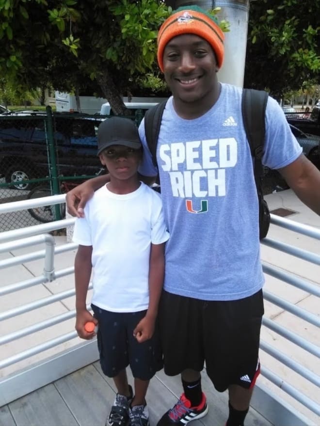 A young Antione Jackson (left) with Duke Johnson (right)
