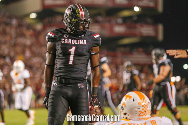 Deebo Samuel South Carolina Gamecocks Unsigned Red Jersey Running Photograph