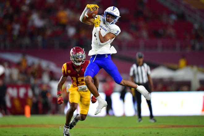 Charles Ross makes a catch against USC last season.