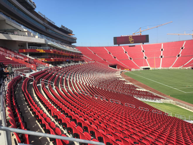 The new seats bring a fresh shine to the bowl inside the Coliseum.