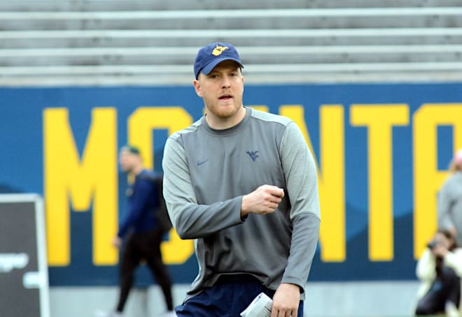 West Virginia Mountaineers football program has two new assistants.