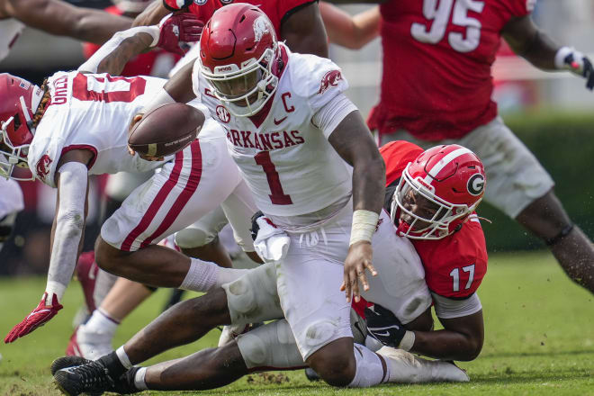 Arkansas quarterback KJ Jefferson is tackled during a loss at Georgia on Oct. 2, 2021.