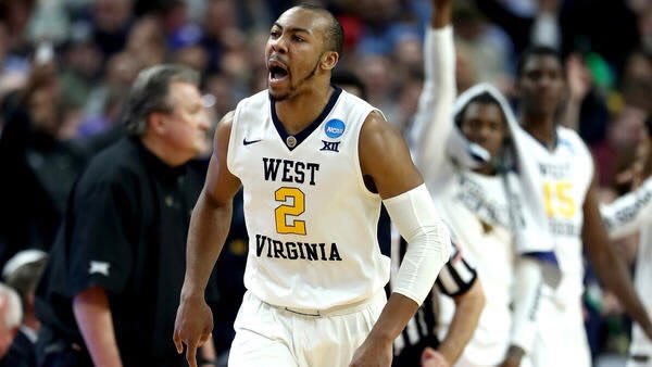 Carter is the leader of the West Virginia basketball team.