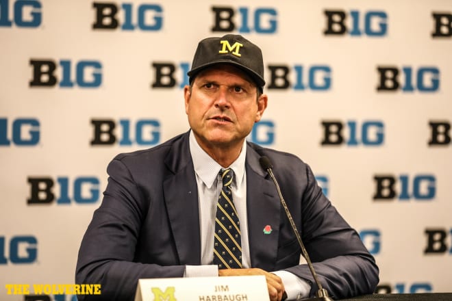 Michigan Wolverines head football coach Jim Harbaugh didn't back down on his Urban Meyer comments Friday. 