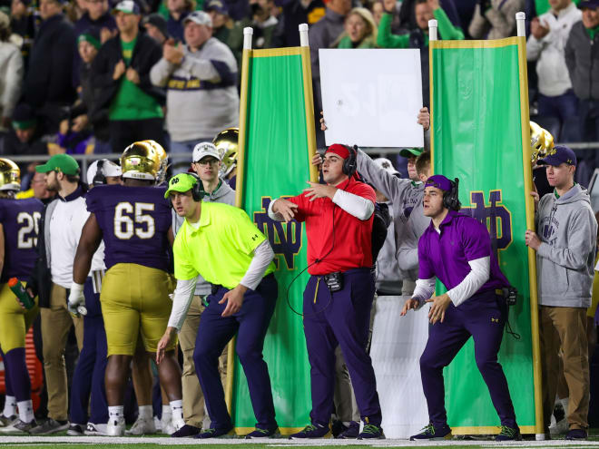 The Notre Dame defense deployed three assistants to disguise defensive play calls.