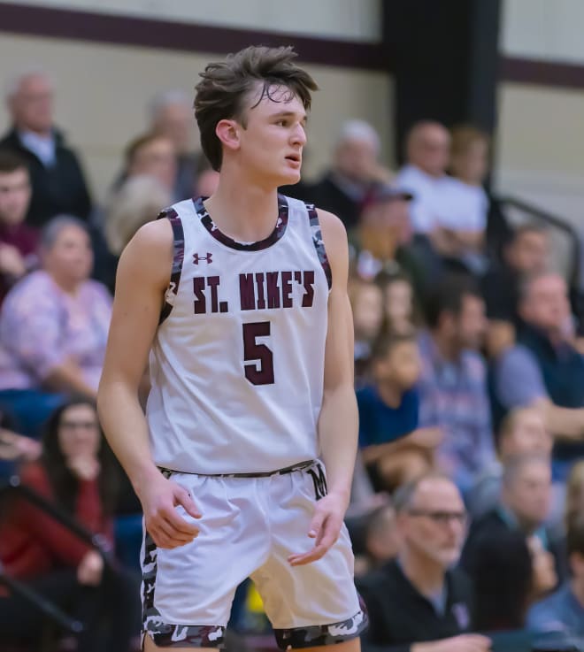 St. Michaels Crusaders guard Bo Ogden (5) waits in his offensive position as the ball comes up court against the St. Stephens Spartans during the second periodat the non-district TAPPS 5A boys basketball game on Friday, Dec 15, 2023, at St. Michael's High School - Austin, TX. © John Gutierrez / USA TODAY NETWORK