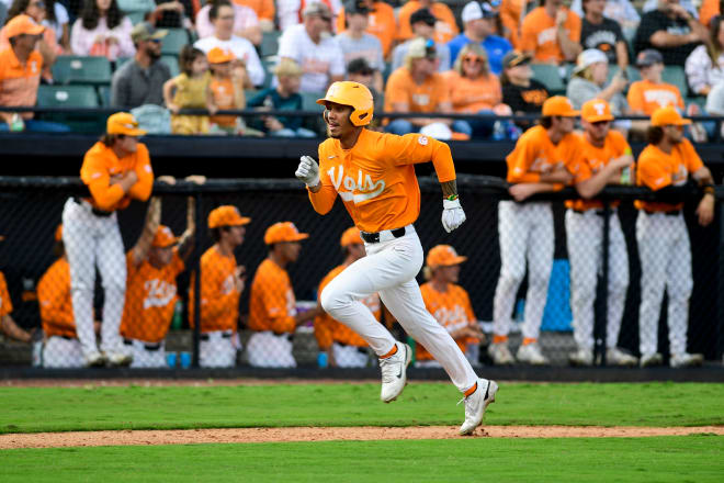 Tennessee infielder Maui Ahuna scores a run in Tennessee's fall scrimmage against Memphis at The Ballpark in Jackson, Tennessee. 