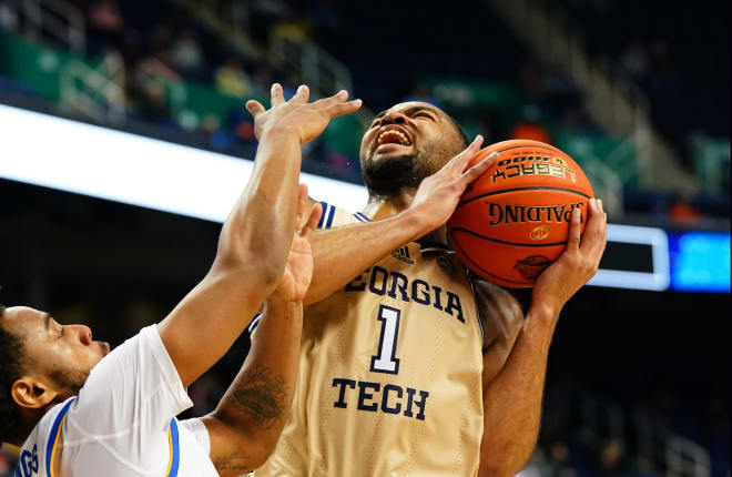 Sturdivant guards the ball as he drives against a Pitt defender in the loss on Wednesday