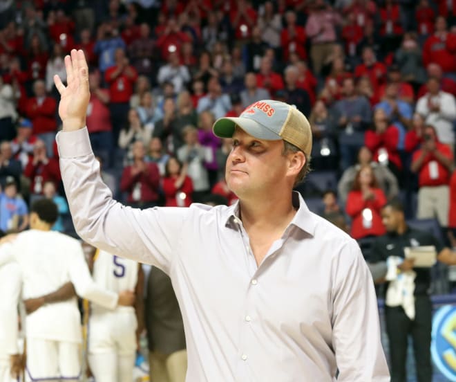 Ole Miss coach Lane Kiffin waves to fans Saturday night at The Pavilion at Ole Miss. 