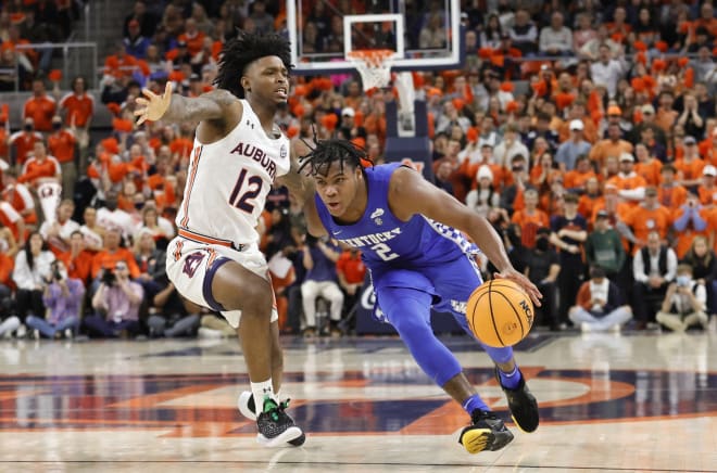 Kentucky's Sahvir Wheeler drove past Auburn's Zep Jasper during the regular-season matchup between the Cats and Tigers.