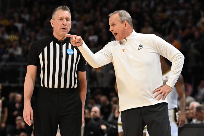 Mar 31, 2024; Detroit, MI, USA; Tennessee Volunteers head coach Rick Barnes talks with an official in the first half against the Tennessee Volunteers during the NCAA Tournament Midwest Regional Championship at Little Caesars Arena.
