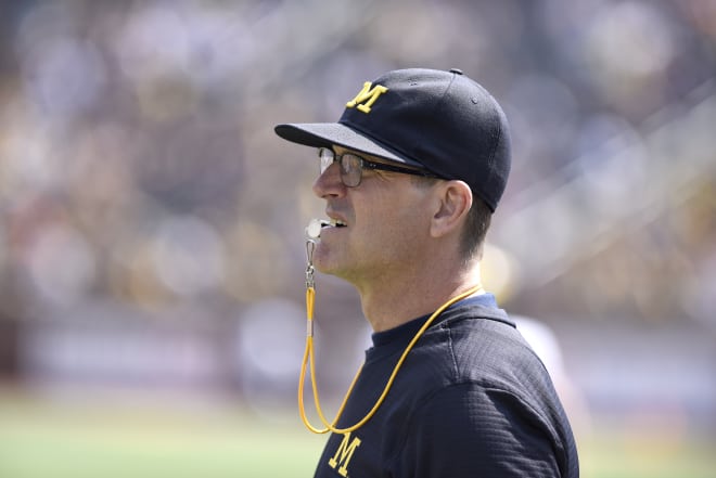 Jim Harbaugh and Michigan are 39-point favorites Saturday.