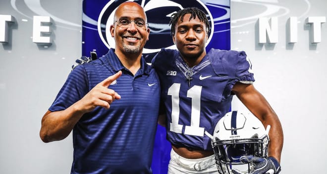 Gaines poses for a photo with head coach James Franklin.
