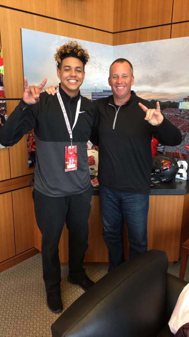 Galloway poses for a picture with NC State head coach Dave Doeren after getting an offer from the Pack.