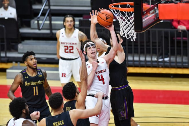 Feb 13, 2021; Piscataway, New Jersey, USA; Rutgers Scarlet Knights guard Paul Mulcahy (4) shoots the ball against the Northwestern Wildcats in the second half at Rutgers Athletic Center (RAC). 