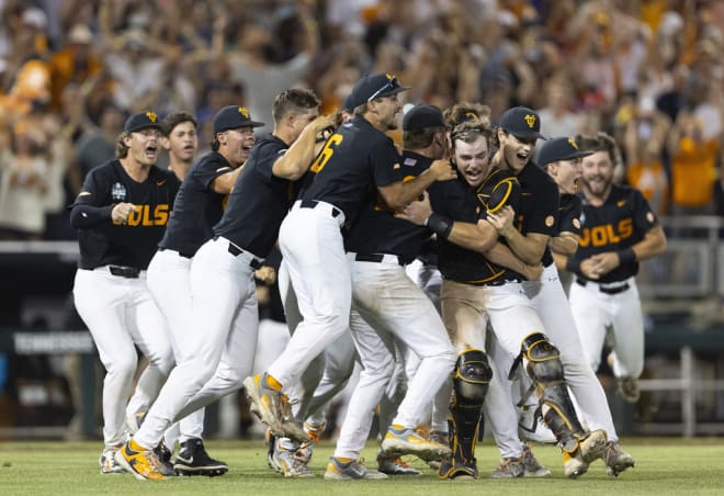 Tennessee players celebrate their 6-5 victory against Texas A&M in Game 3 of the NCAA College World Series baseball finals in Omaha, Neb., Monday, June 24, 2024. (AP Photo/Rebecca S. Gratz)   Photo Details