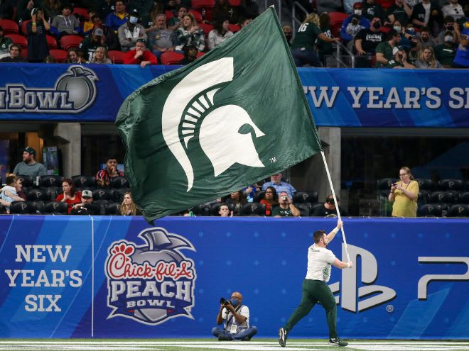 Michigan State flag waves during the 2021 Peach Bowl