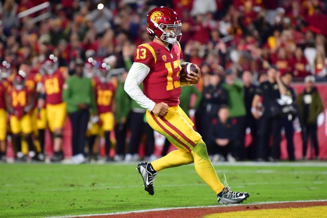 USC QB Caleb Williams rushed for 2 touchdowns and threw for 3 more Friday night.