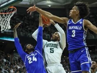 MSU freshman guard Tre Holloman drives to the basket