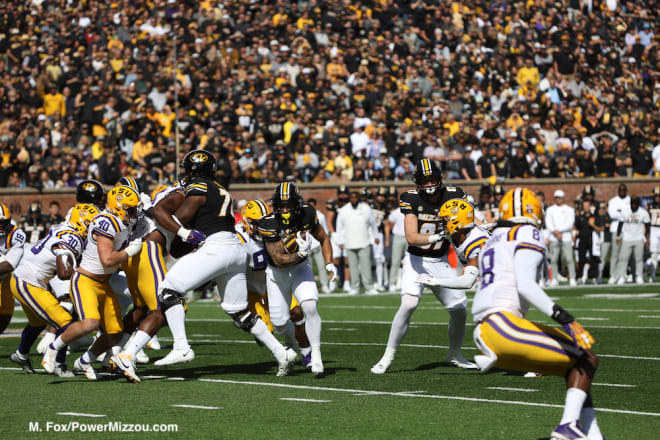 Cody Schrader ran for 114 yards and three touchdowns in Missouri's 49-39 loss