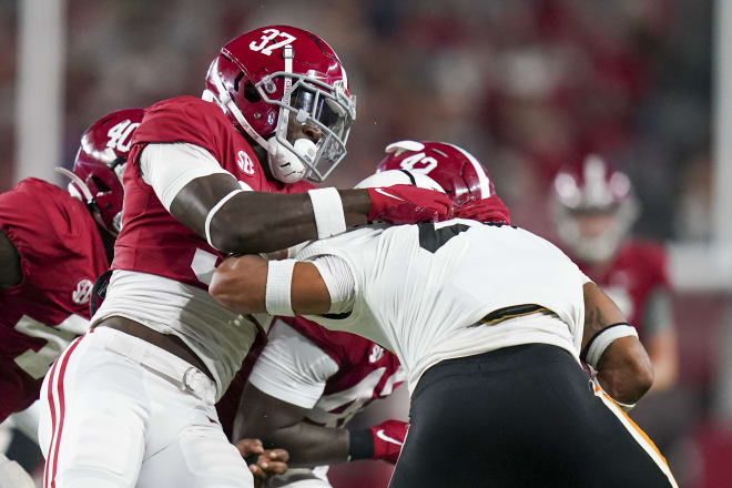 labama Crimson Tide linebacker Demouy Kennedy (37) tackles the Southern Miss Golden Eagles ball carrier at Bryant-Denny Stadium. Photo | Marvin Gentry-USA TODAY Sports