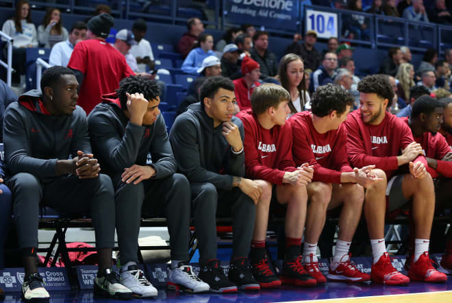 Alabama basketbal guard Jahvon Quinerly, center, is adapting well to his role of coming off the bench for the Crimson Tide. Photo | Getty Images