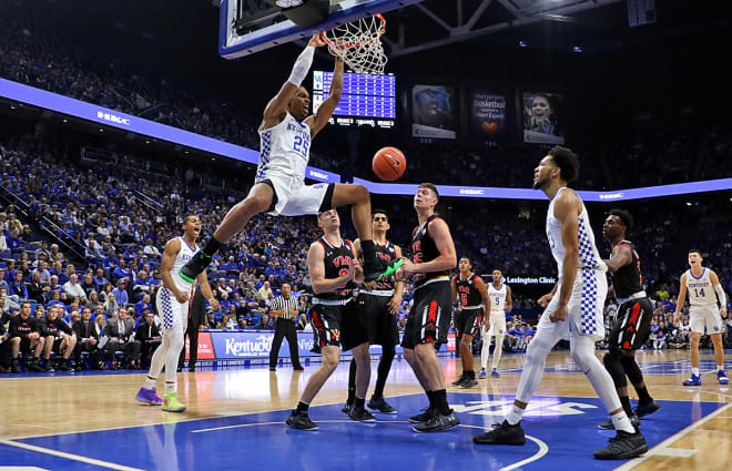 Kentucky's PJ Washington slammed in two points in the first half of Sunday's game against VMI.