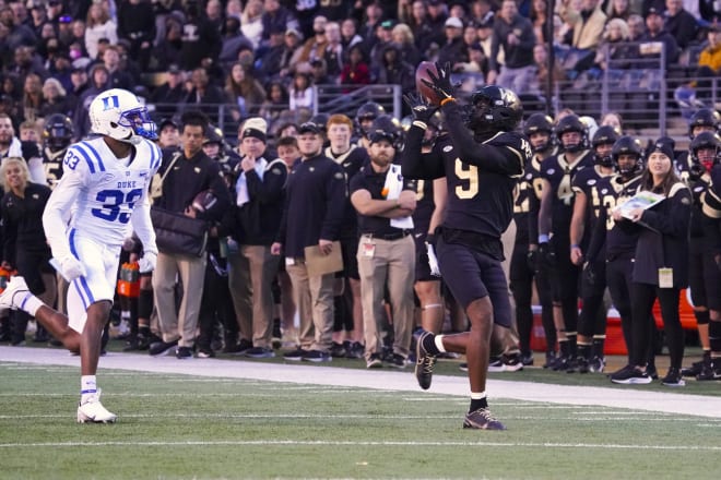 Wake Forest's A.T. Perry makes a catch in front of Duke's Leonard Johnson during last season's game. 