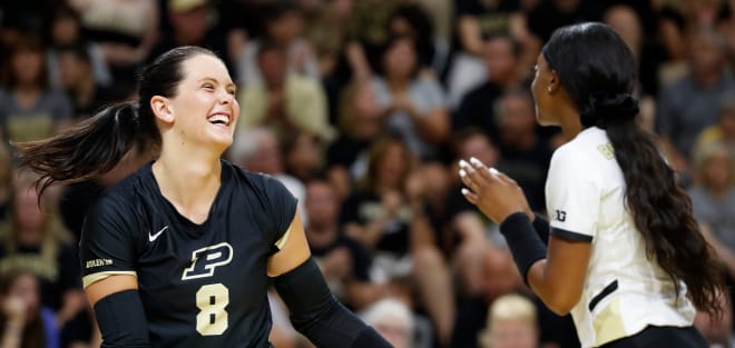 Purdue Boilermakers Maddie Schermerhorn (8) and Purdue Boilermakers Raven Colvin (7) laugh together during the NCAA women s volleyball match against the Creighton Bluejays, Saturday, Aug. 26, 2023, at Purdue University s Holloway Gymnasium in West Lafayette, Ind. Creighton won 3-0.