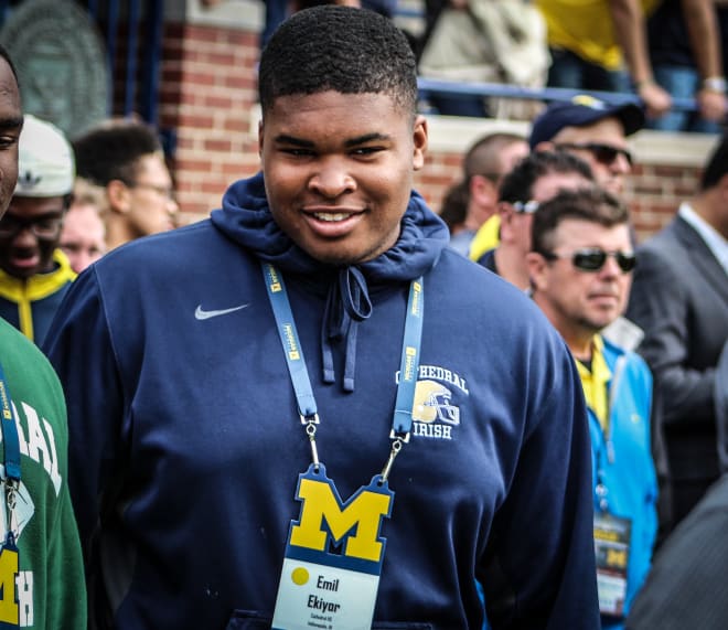 Indianapolis Cathedral four-star offensive guard and Michigan pledge Emil Ekiyor said he'll be back at Michigan in a few weeks for the annual barbecue.