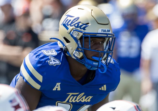 Tulsa linebacker Elijah Wilson surveys the field against OSU earlier this season.