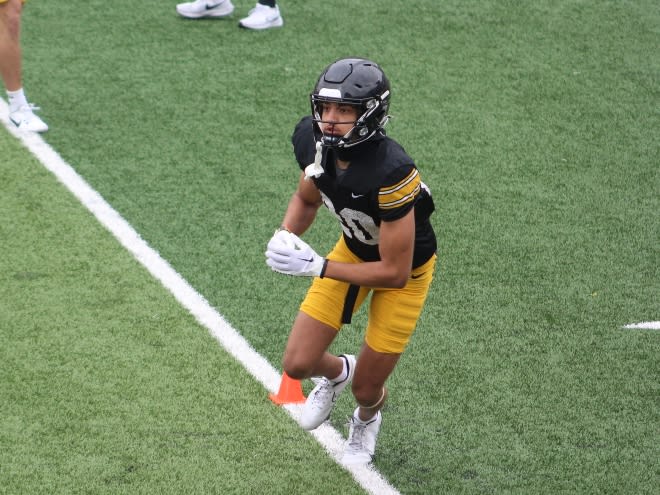 Dayton Howard goes through warmups prior to Iowa's open spring practice. 