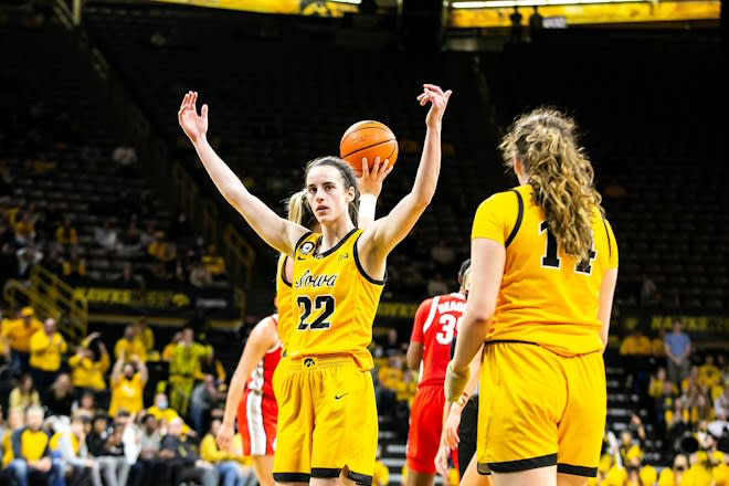 Iowa guard Caitlin Clark (22) pumps up the crowd after drawing a foul during a NCAA Big Ten Conference women's basketball game against Ohio State, Monday, Jan. 31, 2022, at Carver-Hawkeye Arena in Iowa City, Iowa.