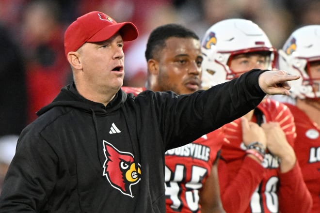 Louisville coach Jeff Brohm directs his team against Notre Dame this season. 